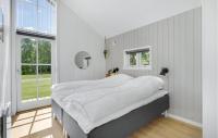 Postel nebo postele na pokoji v ubytování Holiday Home Grønnevænget Blåvand Ix