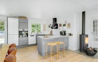 Kuchyň nebo kuchyňský kout v ubytování Holiday Home Grønnevænget Blåvand Ix