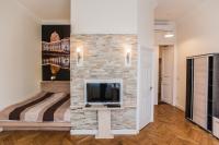 Televízia a/alebo spoločenská miestnosť v ubytovaní All In Apartman