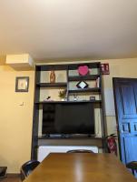 Televízia a/alebo spoločenská miestnosť v ubytovaní Apartamentos Hoz del Huécar