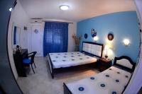 Posteľ alebo postele v izbe v ubytovaní House Stella Tasos