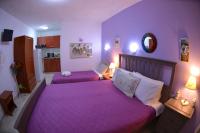Posteľ alebo postele v izbe v ubytovaní House Stella Tasos