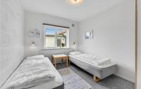 Postel nebo postele na pokoji v ubytování Holiday Home Nørre Nebel 21