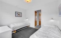 Postel nebo postele na pokoji v ubytování Holiday Home Nørre Nebel 21