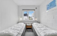 Postel nebo postele na pokoji v ubytování Holiday Home Nørre Nebel 21