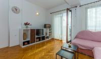 Televízia a/alebo spoločenská miestnosť v ubytovaní Apartment Domijan by El-pi tours