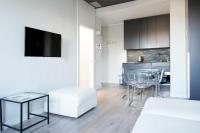 Televízia a/alebo spoločenská miestnosť v ubytovaní Jewel Apartment vista Duomo 100m