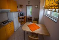 Kuchyňa alebo kuchynka v ubytovaní Apartments Daju