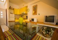 Kuchyňa alebo kuchynka v ubytovaní Apartments Daju
