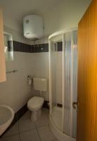 Kúpeľňa v ubytovaní Apartments Daju