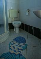 Kúpeľňa v ubytovaní Apartments Daju
