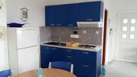 Kuchyňa alebo kuchynka v ubytovaní Apartments Daju