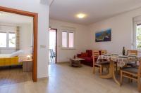Łóżko lub łóżka w pokoju w obiekcie Apartments Zvone1