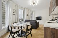 Televízia a/alebo spoločenská miestnosť v ubytovaní 268 Suite Ville - Superb apartment in Paris
