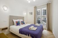 Posteľ alebo postele v izbe v ubytovaní 268 Suite Ville - Superb apartment in Paris