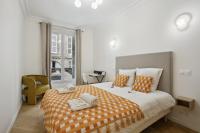 Posteľ alebo postele v izbe v ubytovaní 268 Suite Ville - Superb apartment in Paris