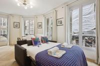 Posteľ alebo postele v izbe v ubytovaní 268 Suite Ville - Superb apartment in Paris