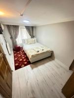 A bed or beds in a room at Amore Hotel Istanbul