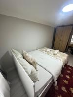 A bed or beds in a room at Amore Hotel Istanbul
