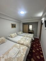 A bed or beds in a room at Amore Hotel Istanbul