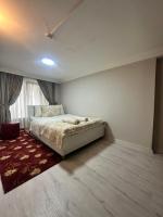 A bed or beds in a room at Amore Hotel Istanbul