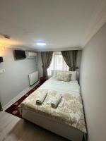 A bed or beds in a room at Amore Hotel Istanbul