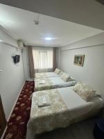 A bed or beds in a room at Amore Hotel Istanbul