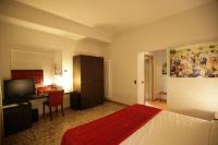 Posteľ alebo postele v izbe v ubytovaní Hotel Piazza Marconi