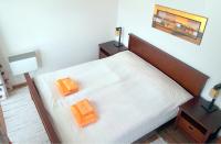 Posteľ alebo postele v izbe v ubytovaní Hrabovo Lake View Apartment