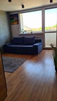 Posedenie v ubytovaní Apartament przy alei Kopernika