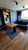 Posedenie v ubytovaní Apartament przy alei Kopernika
