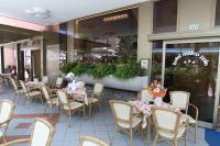 Reštaurácia alebo iné gastronomické zariadenie v ubytovaní Hotel Marco Polo