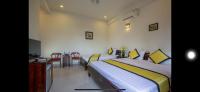 Quynh Chau Homestay Hội Anにあるベッド