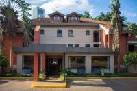 a building with a tower on top of it at Heri Heights Hotel Apartments, SureStay Collection by Best Western in Nairobi