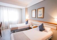 Posteľ alebo postele v izbe v ubytovaní Hotel Alda Boiro