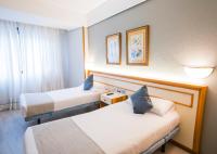 Posteľ alebo postele v izbe v ubytovaní Hotel Alda Boiro