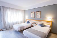 Posteľ alebo postele v izbe v ubytovaní Hotel Alda Boiro
