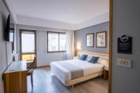 Posteľ alebo postele v izbe v ubytovaní Hotel Alda Boiro