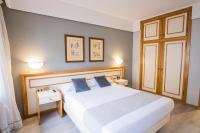 Posteľ alebo postele v izbe v ubytovaní Hotel Alda Boiro