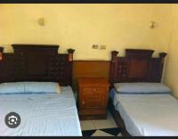 Postel nebo postele na pokoji v ubytování 2 bedroom for families
