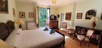Postel nebo postele na pokoji v ubytování La Casona de La Vega junto a Cangas de Onís