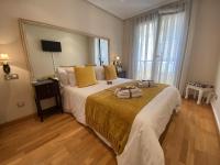 Postel nebo postele na pokoji v ubytování Clarens Guesthouse