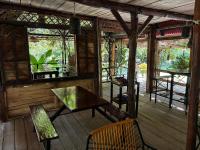 Патио или другая зона на открытом воздухе в Bamboo River Lodge