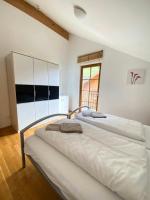 Posteľ alebo postele v izbe v ubytovaní Isabella 5 by SMR Rauris Apartments - inc Spa and near Gondola