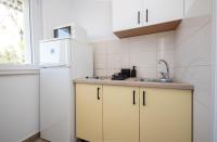 Kuchyň nebo kuchyňský kout v ubytování Apartments Ivan