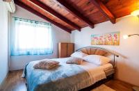 Łóżko lub łóżka w pokoju w obiekcie Apartments Brane