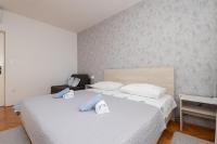 Postel nebo postele na pokoji v ubytování Apartments Ivan