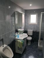 Kúpeľňa v ubytovaní Apartment Tomi
