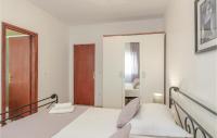 Łóżko lub łóżka w pokoju w obiekcie Apartment Prizba Bb Iv