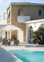 The swimming pool at or close to La Via del Mare